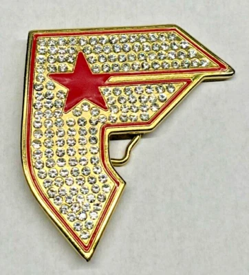 Famosa hebilla de cinturón pedrería roja y dorada estrella vintage Foto 1 de 2