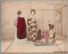 Japan, Girls dressing clothes  Vintage albumen print. 日本  Tirage albuminé aqua