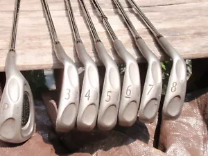 JUEGO DE 7 PALOS DE GOLF ARMADURA TI 100 HIERROS DE TITANIO PURO EJES RÍGIDOS ACERO - Imagen 1 de 12