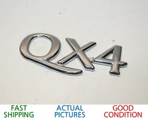 1997-2003 INFINITI QX4 REAR TAILGATE TRUNK LID EMBLEM BAGE OEM - Picture 1 of 3
