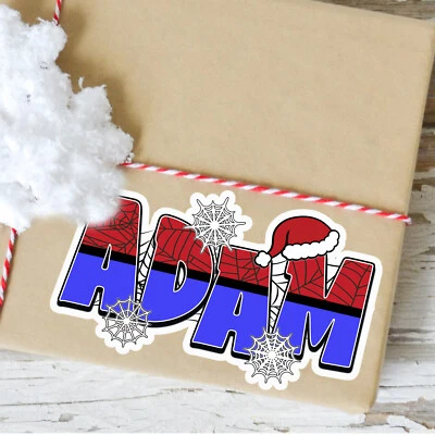Pegatina con nombre personalizada · Calcomanía de vinilo personalizada · Tema de superhéroe · Navidad Foto 1 de 4