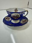 VINTAGE Royal Sealy Footed Tea cup Cobalt Blue Courting Couple Saucer Gold Trim
