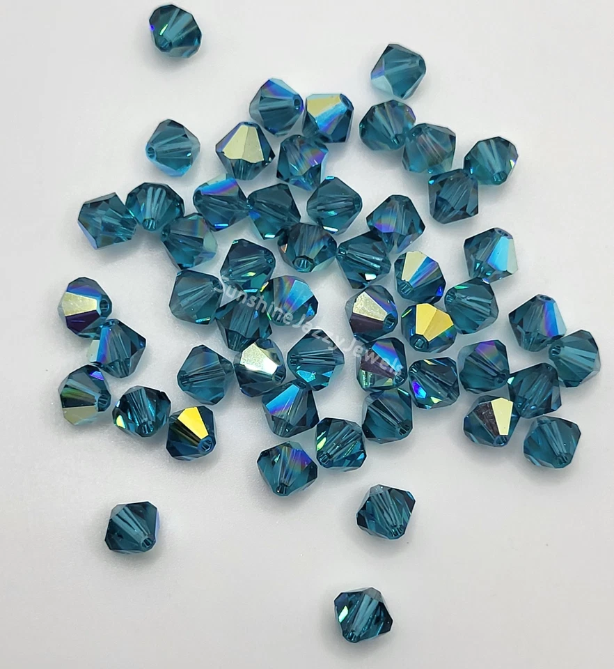12pc Swarovski Crystal Indicolite AB 6mm Bicone Beads; Teal Turquoise - Image 1 of 1