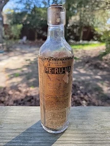 Vintage PE-RU-NA Elixer Bottle W/ Partial Label - Picture 1 of 9