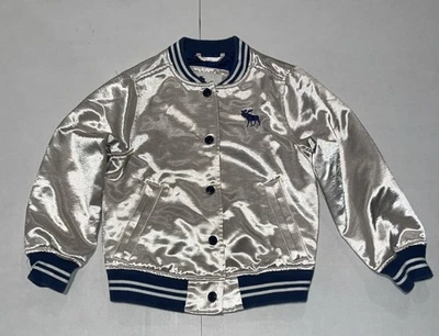 Chaqueta de bombardero metálica para niños Abercrombie dorada plateada azul a presión universitaria talla 5/6 B57 Foto 1 de 4