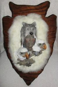 WOOD CARVED INDIAN CHIEF WITH WOLF HEADDRESS AND EAGLES, FUR BACKGROUND - Picture 1 of 7