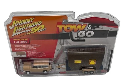 JOHNNY LIGHTNING 1981 JEEP WAGONEER WITH TRAILER TOW AND GO NEW CAMEO TAN - Image 1 of 4