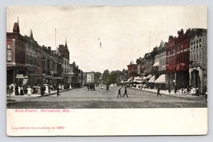 Main Street Scene Reedsburg Wisconsin Downtown Dirt Road People c1097 Postcard - Picture 1 of 2
