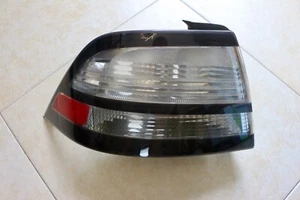 08-11 SAAB 93 SEDAN LEFT REAR LH, DRIVER SIDE, QRTER TAIL LIGHT CLEAR # 12785759 - Picture 1 of 9