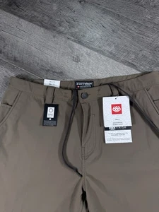 NWT 686 Everywhere Hybrid Short Relaxed 36X11 Tobacco Brown KCRGNS15 - Picture 1 of 3