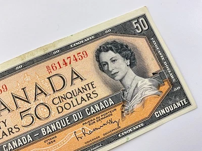 Бывшая в обращении банкнота Канады номиналом 50 долларов 1954 с префиксом BH Beattie Rasminsky II624 - Изображение 1 из 4