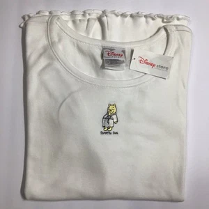 Woman’s Disney Store Pampered Pooh Short Sleeve Shirt Size L/XL Ruffled Bottom - Picture 1 of 4