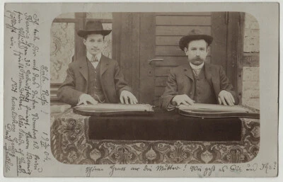Orig. 1904 two men playing zither, RPPC - Image 1 of 2