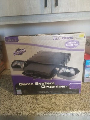 INTERACT ACESSORIES- GAME SYSTEM ORGANIZER- PS2- PLAYSTATION 2 -New - Image 1 of 4