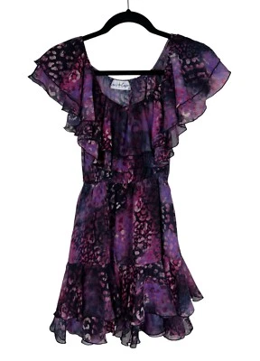 Mini Vestido Cari Capri Púrpura Estampado Leopardo Talla XS Barbados Volantes Hombro Descubierto Foto 1 de 4