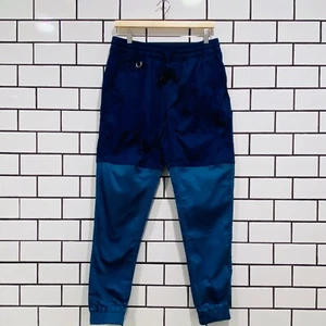 PUBLICA JOGGER DOS TONOS AZUL/CIAN - Imagen 1 de 7
