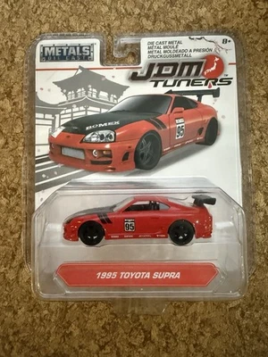 Jada Toys 1995 Toyota Supra rojo JDM sintonizadores MT40 metales fundido a presión 1/64 pilotos reales Foto 1 de 2