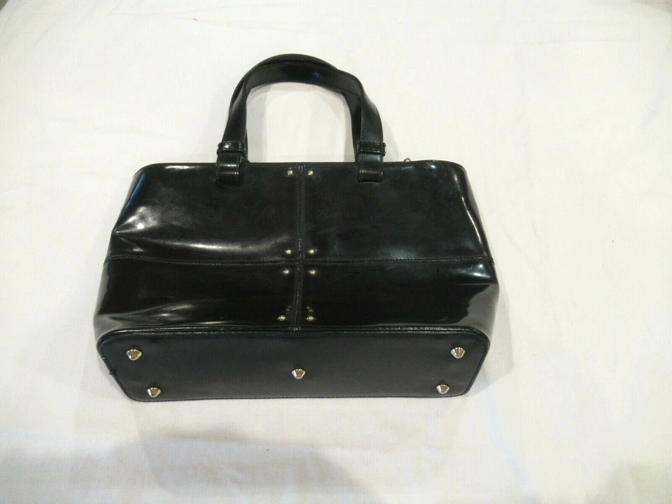 Monedero Jaeger de cuero negro con asa superior, hecho en Italia Foto 1 de 4