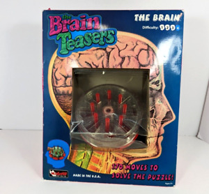 The Brain Teasers Puzzle MagNif 2010 Difficulty Level 4 USA UNOPENED Damaged Box