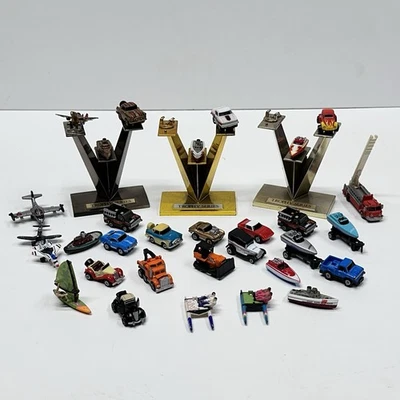Vintage Micro Machines Cars, Trucks, Boats & Planes with Trophy Series Stands - Image 1 of 4