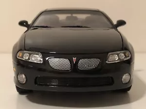 1:18 2004 Pontiac GTO Phantom Black Ertl *READ* - Picture 1 of 23