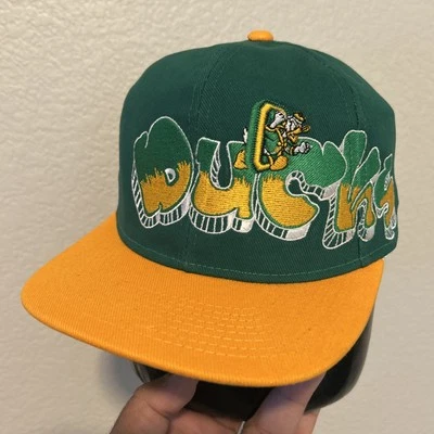 Gorra Oregon Ducks TOW Doble Graffiti Personalizada Snapback NCAA Foto 1 de 4