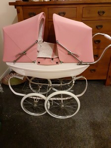 silver cross twin pram dolls