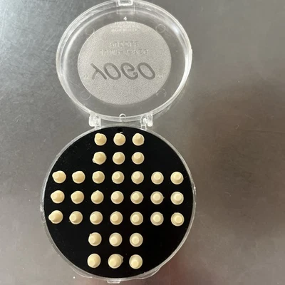 Vintage YOGO Jump A Peg Puzzle Travel Game - Image 1 of 3