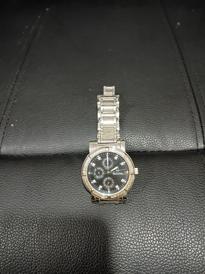 BULOVA 96E04 Diamond Accented Black Dial Day/Date Silver Tone Men's Watch $675 - Image 1 of 4