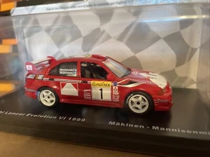 1/43 MITSUBISHI LANCER EVO 6 RALLY MONTE CARLO 1999 TOMMI MAKINEN - Picture 1 of 1