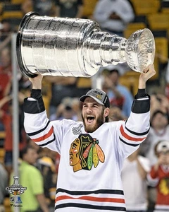 Brandon Saad Blackhawks Unsigned 2013 Stanley Cup Champs Raises Cup Photo - Picture 1 of 1