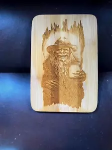 Bigfoot with moonshine on cutting board - Picture 1 of 3