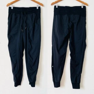 Pantalones de chándal de tiro medio Lululemon TALLA 8 Dance Studio longitud completa 28" - negros - Imagen 1 de 5