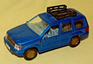 JEEP GRAND CHEROKEE FRICTION ACTION BLUE GOLD DIE CAST 1996 V8 4X4 SS5106 SOLIDO - Picture 1 of 12