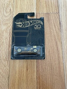 NOS 2017 HOT WHEELS 50th ANNIVERSARY RODGER DODGER CAR 3-6 BLACK AND GOLD - Picture 1 of 4