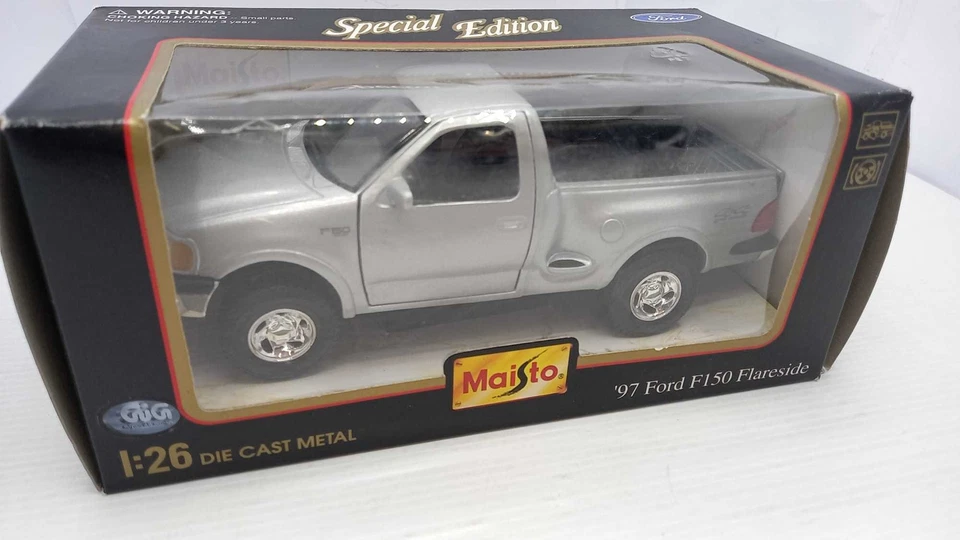 MAI31921 Maisto Ford F150 Flareside 1997 1/26, confezione lievemente usurata - Immagine 1 di 1