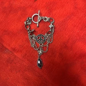 PULSERA MARCA JUICY COUTURE SIGNO DE LA PAZ (a11) - Imagen 1 de 9