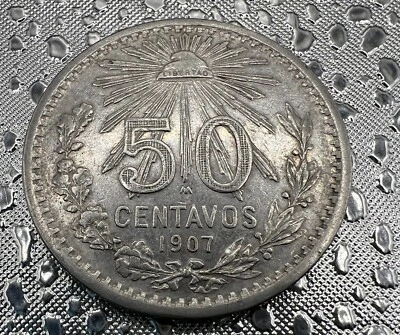 1907  MEXICO 50 CENTAVOS CURVED 7 COLLECTOR COIN 80% SILVER - Image 1 of 4