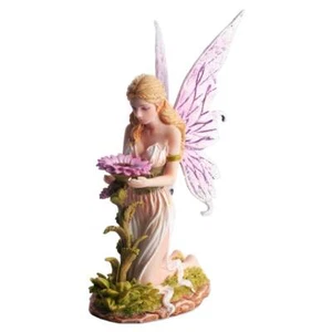 Frühlingsfee Florina kniet schützend vor Blume - Picture 1 of 1