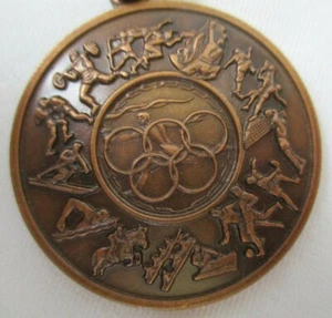 OLYMPISCHE MÜNZE KUPFER SCHLÜSSELANHÄNGER SCHLÜSSELRING - Bild 1 von 5