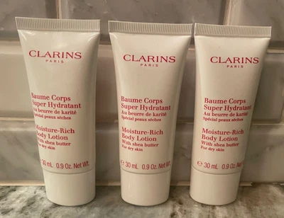 Loción corporal rica en humedad Clarins 3 piezas con manteca de karité 0,9 oz X 3 sellada Foto 1 de 2
