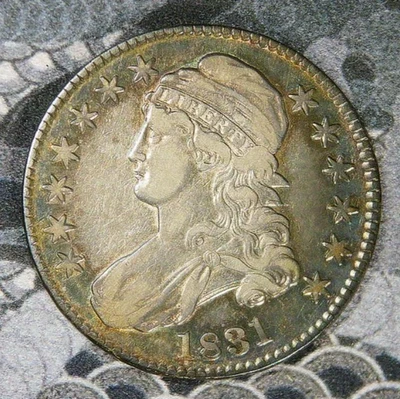 Medio dólar busto tapado 1831 - ¡Bonita moneda de alta calidad con hermoso tono!! Foto 1 de 4