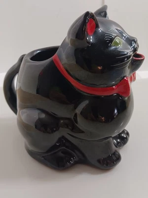 Crema vintage Shafford Redware cerámica gato negro con ojos verdes y lazo rojo Foto 1 de 4