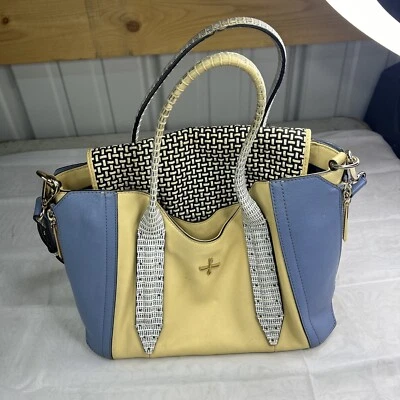 Bolso de Mano Pour La Victoire Cuero Azul/Tostado Detalle Repujado Foto 1 de 2