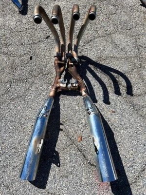 Used Stock Exhaust System For A 1990s Honda CB750 SC Nighthawk Motorcycle - Image 1 of 4