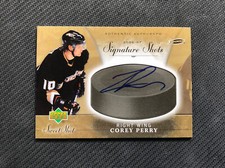 2006-07 UPPER DECK SWEET SHOT COREY PERRY SIGNATURE SHOTS PUCK AUTO #SS-CP