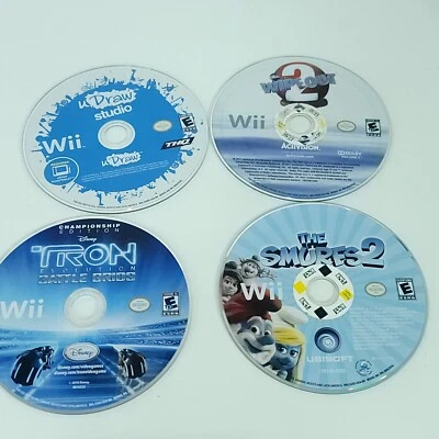 Nintendo Wii Games Lot of 4 Bundle Tron Smurfs 2 U Draw Wipeout 2  - Image 1 of 4