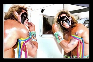 WWE THE ULTIMATE WARRIOR 12X18 GLOSSY WRESTLING PHOTO PUTTING FACE PAINT ON RARE - Picture 1 of 1