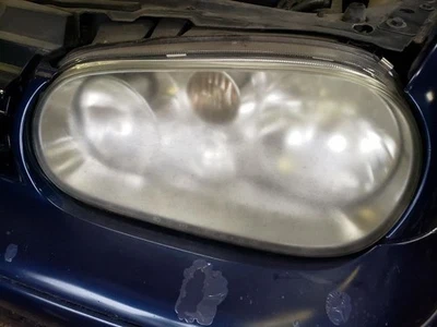 Driver Headlight Thru VIN 057051 Without Fog Lamps Fits 99-02 GOLF 850394 - Image 1 of 4