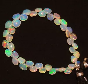 Natural Gem Ethiopian Fire Opal 6 to 7.5mm Size Smooth Heart Briolette 28Cts. 7" - Picture 1 of 7